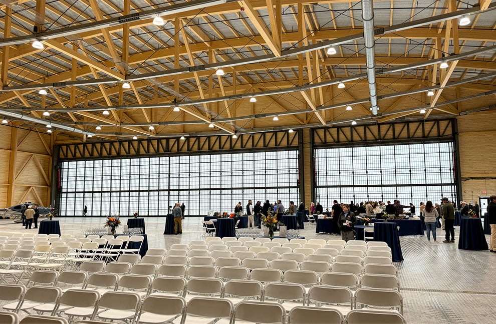 Event being held within hangar fitted with 120ft Schweiss hydraulic door