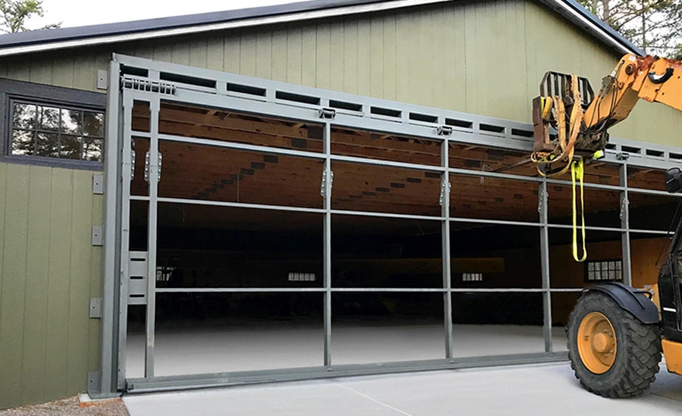 Schweiss hydraulic door with Schweiss hydraulic door framework