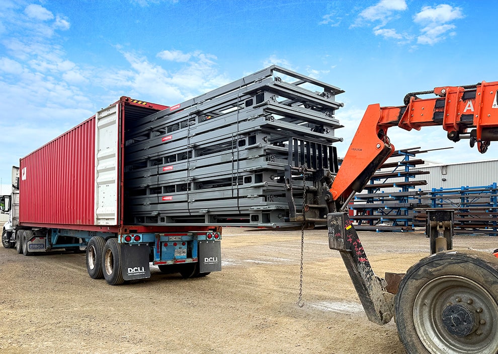 Schweiss doors being loaded into shipping container to be shipped out of the country!