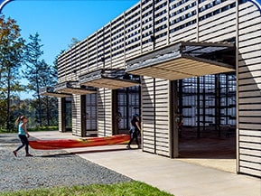 Schweiss bifold doors installed on Beaverdam Crew Facility