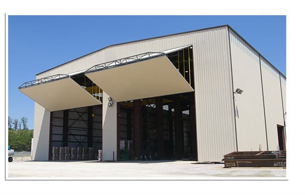 two large bifold doors opening up on machinery shed/shop