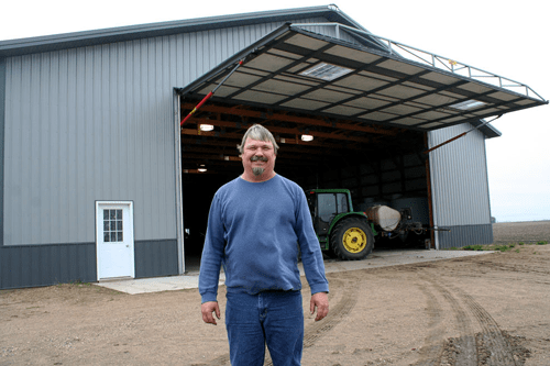 Storing Equipment in shed with Schweiss Hydraulic Door 