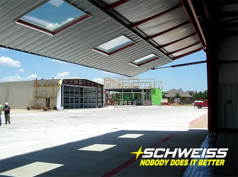 Schweiss hydraulic doors installed on a couple different buildings - nobody does it better than Schweiss Doors