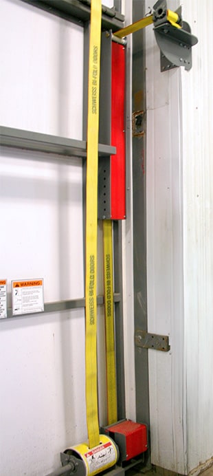 Closeup view of Schweiss Strap Latches installed on a Schweiss bifold door