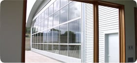 All glass covered bifold hangar door