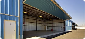 Schweiss bifold doors for steel buildings