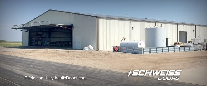 Aerial Spraying Hangar Doors can bring in Semi's