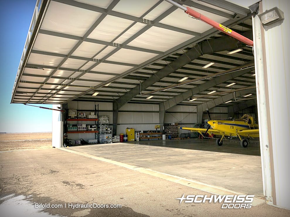 Schweiss Hydraulic One-Piece Door give hangar Nice clean Look