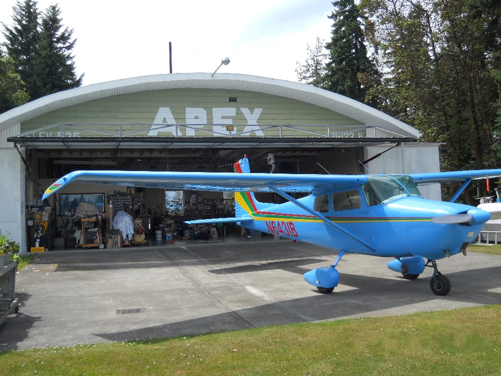 Apex Hangar showing off the open hydraulic door and Cessna 172
