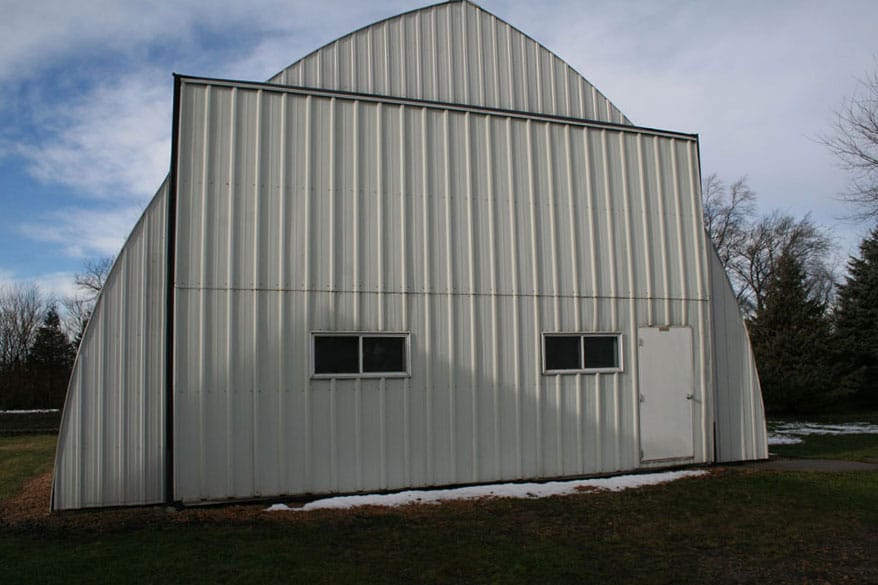 Quonset hut with windows in the Liftstrap bifold door