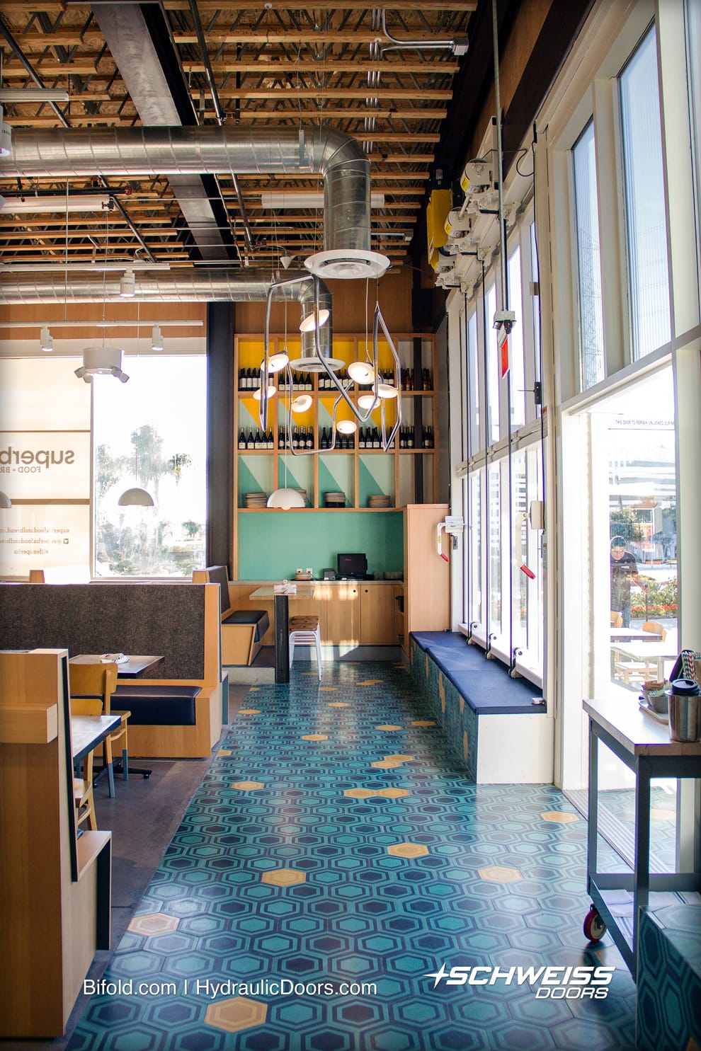 Bifold clearance works with lighting and ducts at El Segundo Restaurant
