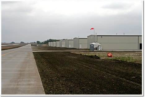 A few of the T-Hangars each with a Bifold Door which is a addition to the airport