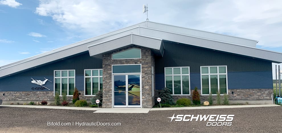 Econo Lumber hangar was renovated with two Schweiss hydraulic hangar doors.