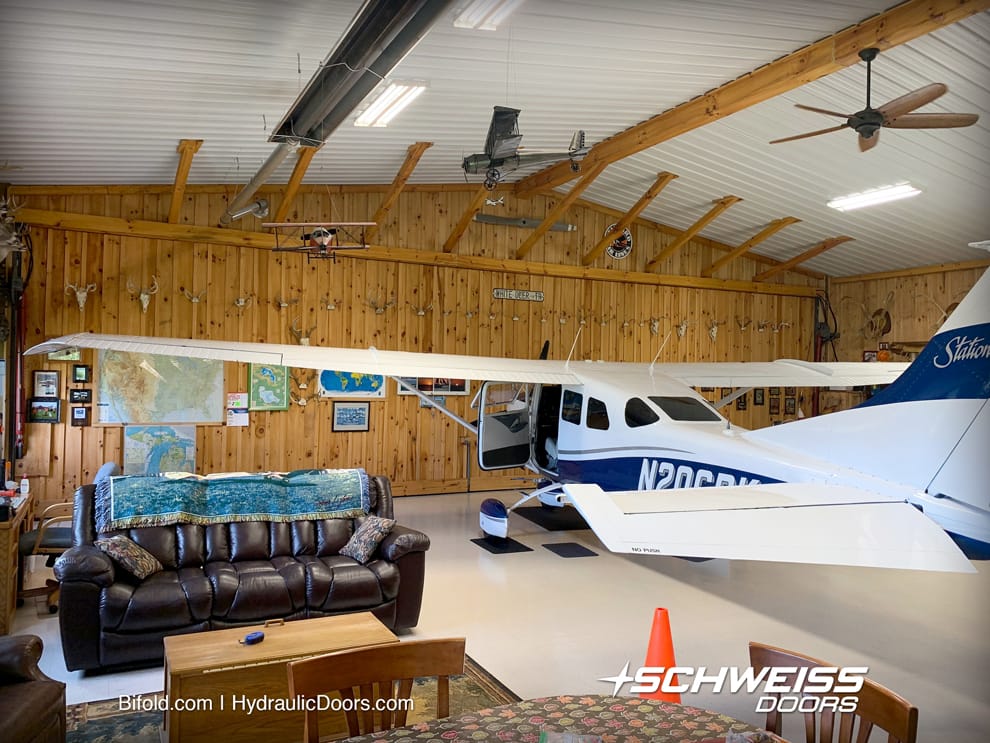 Perfect Condition Cessna inside of Mancave Hangar with Schweiss Hydraulic Door