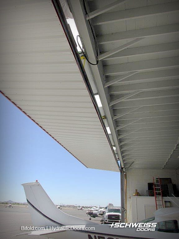 shaded canopy of Bifold doors in Arizona keeps the building cooler for longer