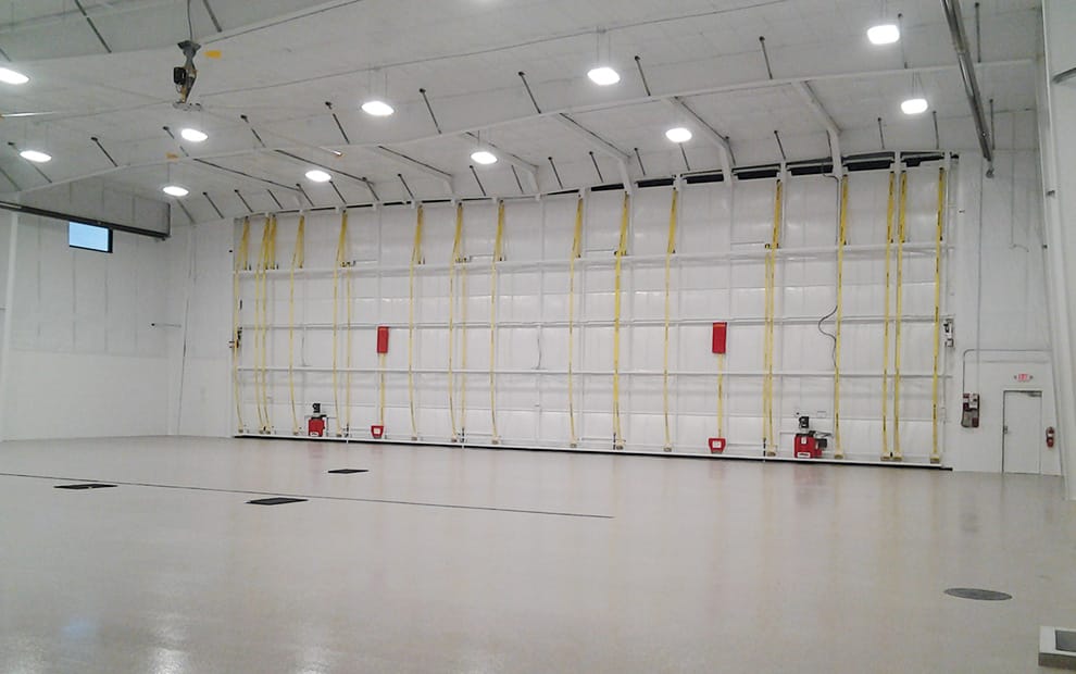 Interior view of Cloudkisser hangar at Southern Wisconsin Regional Airport fitted with Schweiss bifold liftstrap door