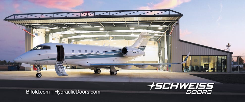 Challenger 300 Business Jet in front of Schweiss Hangar Doors in Eugene, Oregon