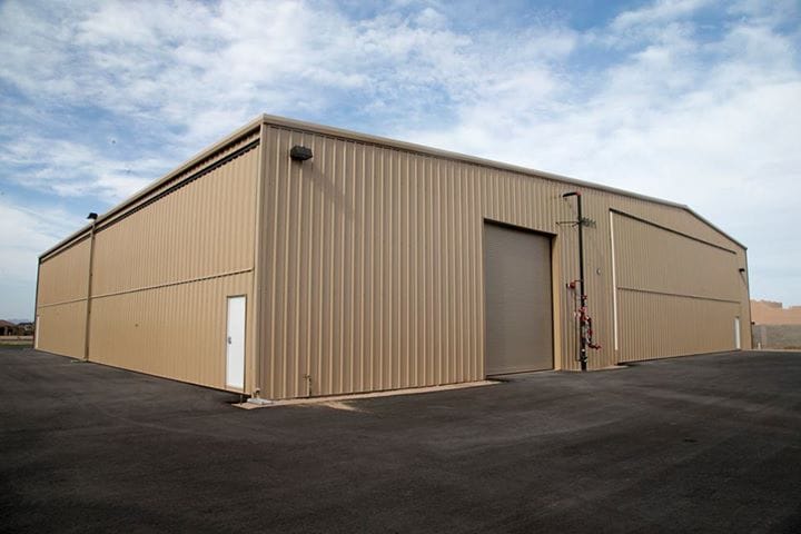 Multiple Schweiss Strap Bifold Doors make this one slick hangar.
