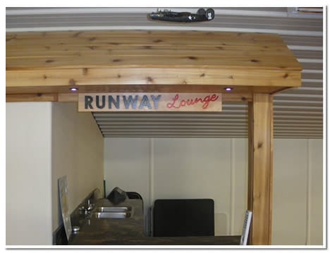 Wet bar attached to wall of mancave