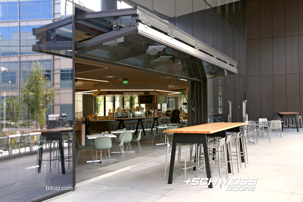 https://www.bifold.com/assets/photooftheday/genentech-pharmacuetical-cafe-patio-bifold-doors-3.jpg