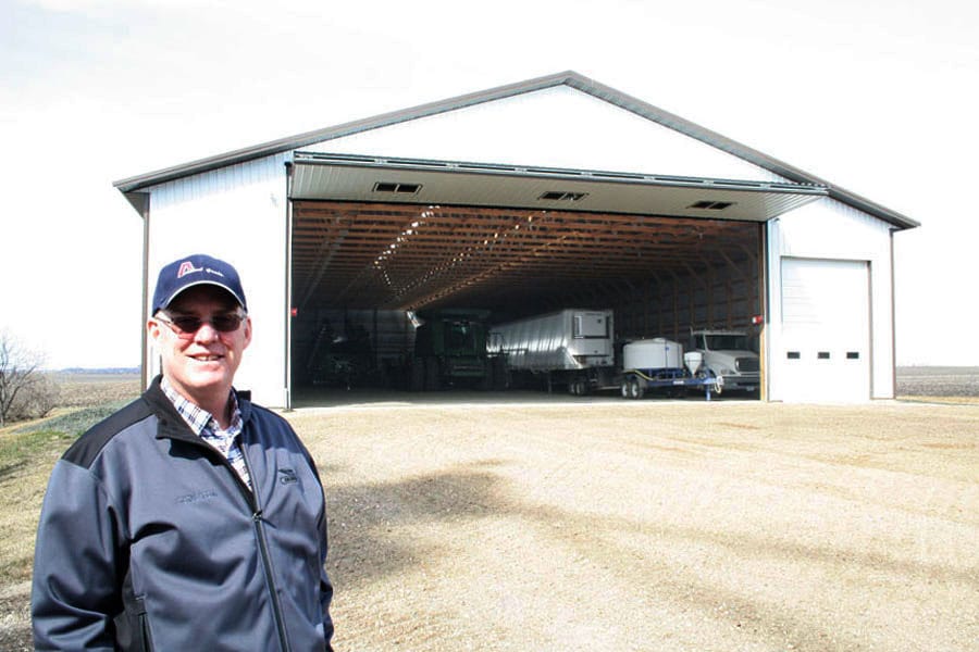 One happy farmer shows off his largest door