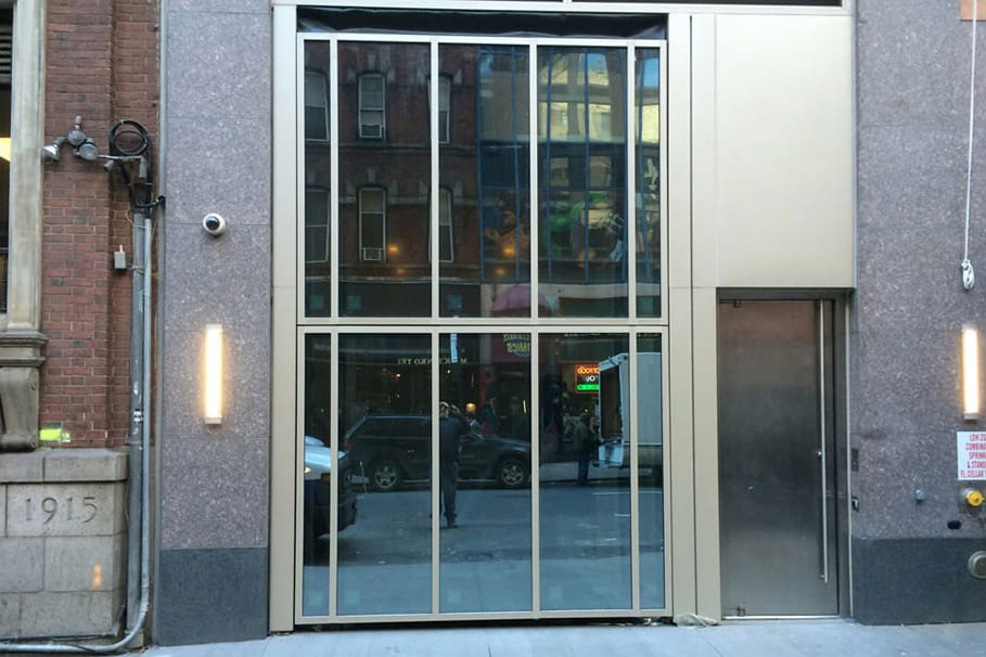 Schweiss Bifold liftstrap glass door