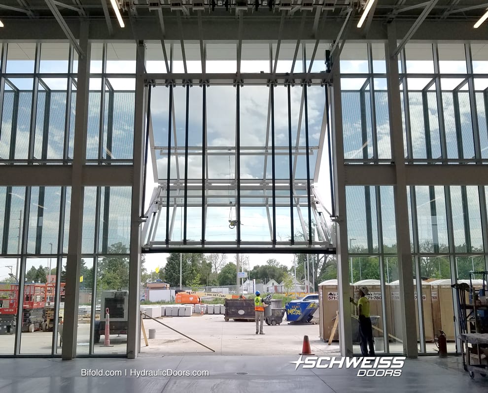 Schweiss Liftstrap Glass Doors matches the look of the Building