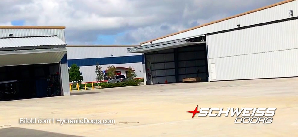 Three Schweiss bifold doors fitted on multiple hangars at Pompano Beach Airpark