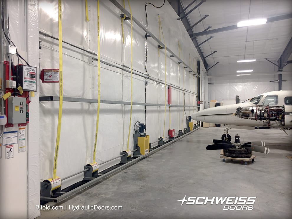 PropWorks of Canada gets Schweiss 60' by 16' bifold liftstrap door.