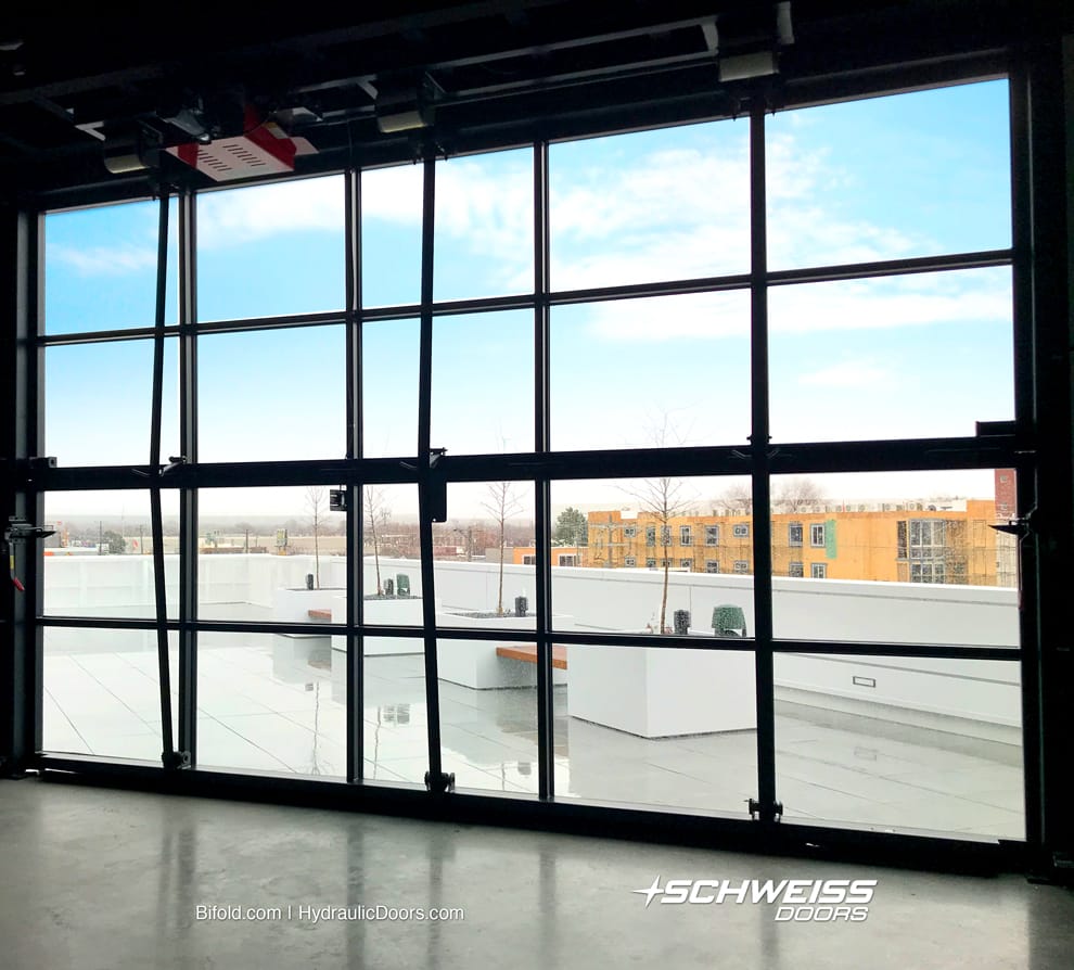 Rooftop Designer Glass Door brings in Natural lighting to performance area
