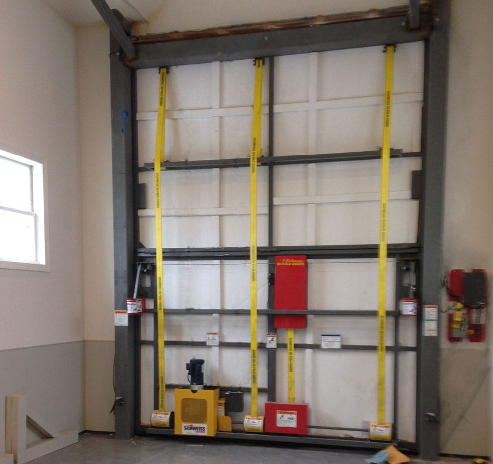 Hidden RV Bifold liftstrap door with autolatches