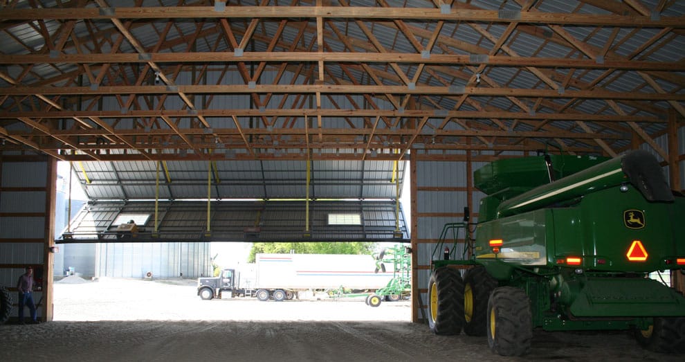 Bifold machine shed door is tall enough for large equipment like combines