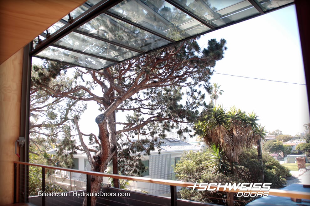 Santa Monica coastline can be viewed through designer glass bifold door