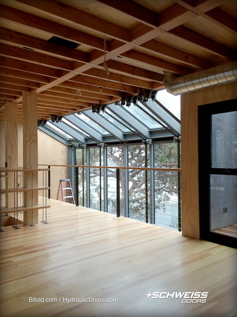 Angled Skylight adds to aesthetics of designer glass bifold doors