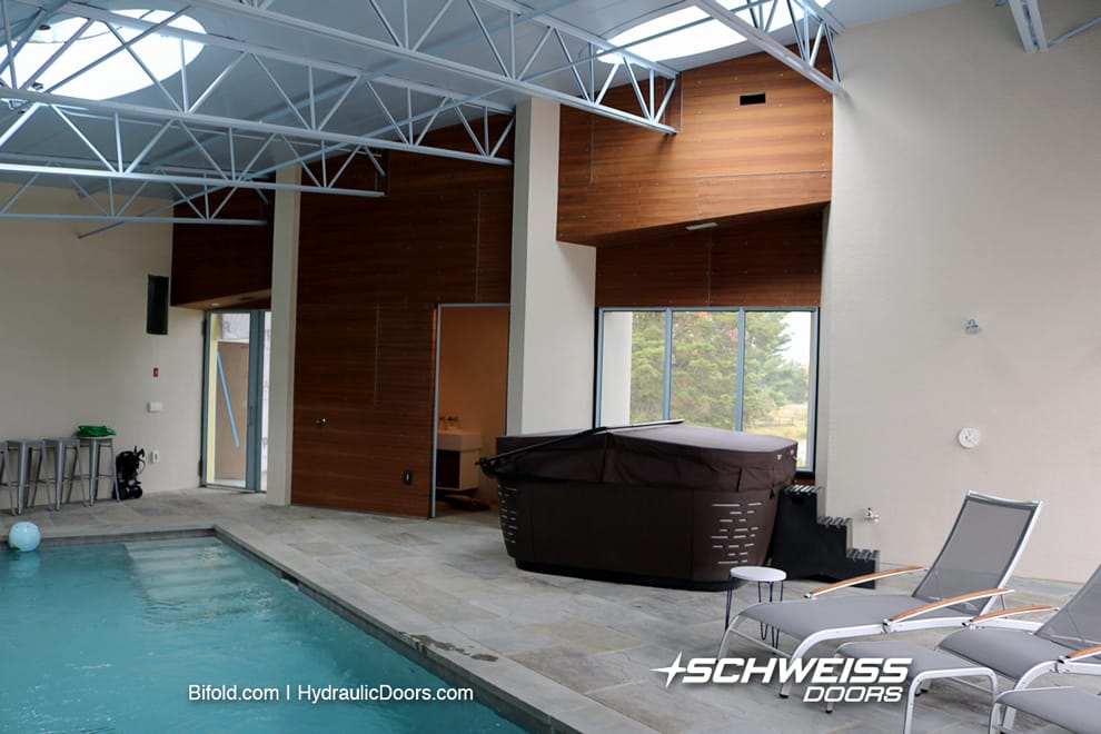 Pool house was made with grill, spa, bathroom, and changing area