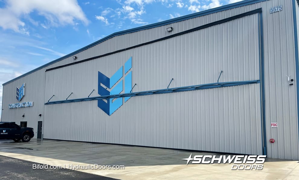 Exterior view of 80 ft Schweiss bifold door fitted on SEI's Hangar A at Morristown Regional Airport shown closed