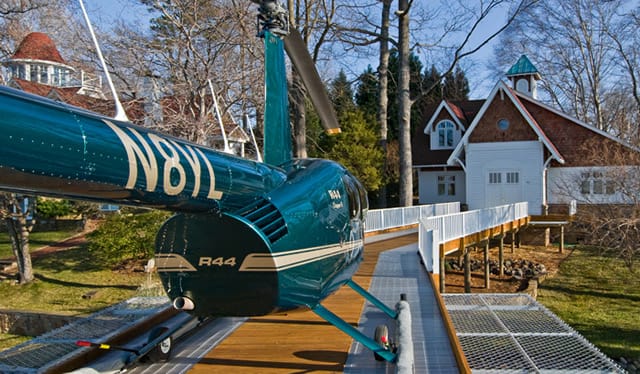 R44 Ready to be taxied through Schweiss hangar Door