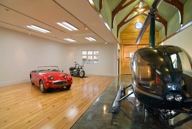 Helicopter inside closed hangar door