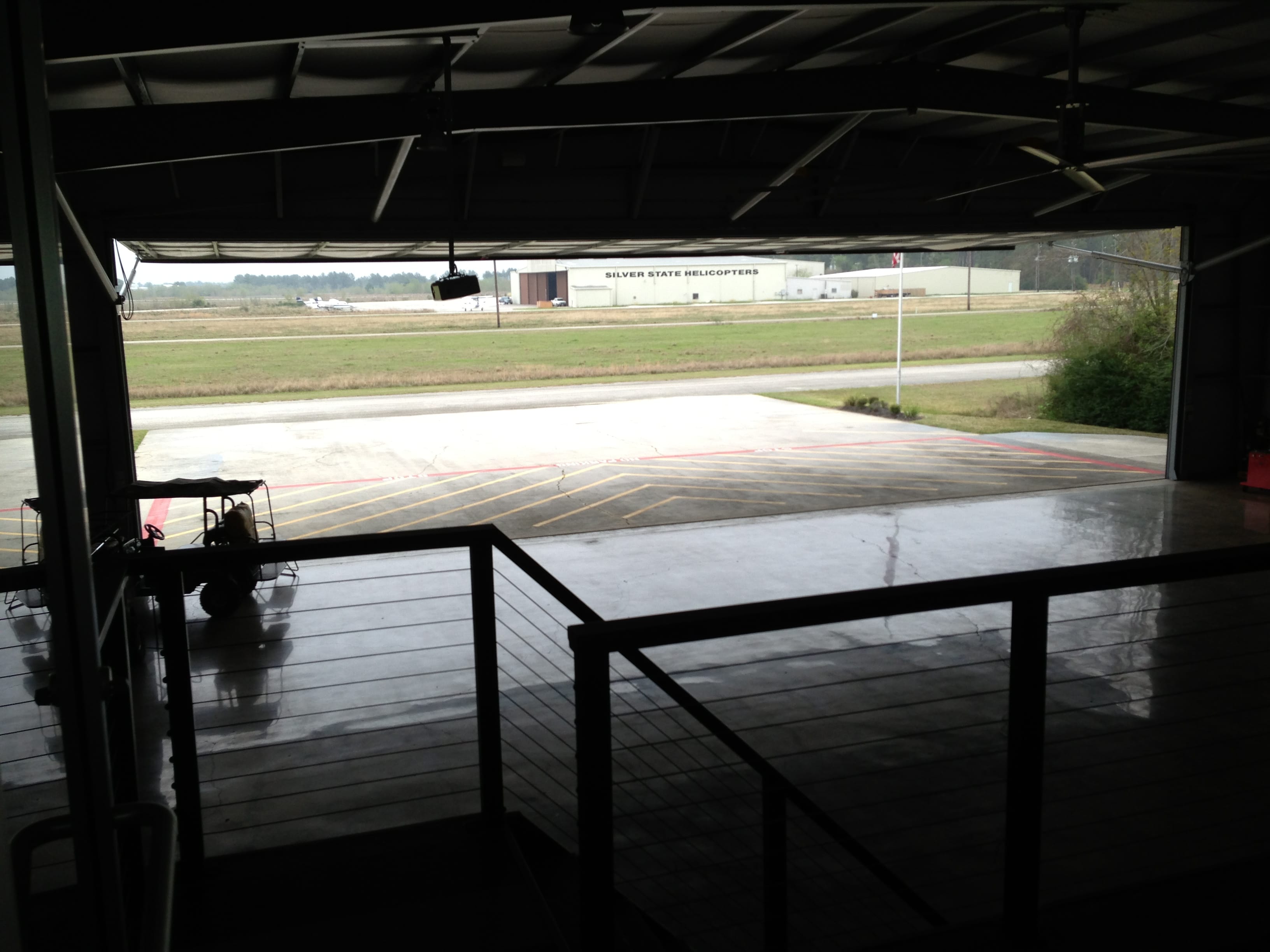 Patricks hangar looking out though large Schweiss hydraulic door