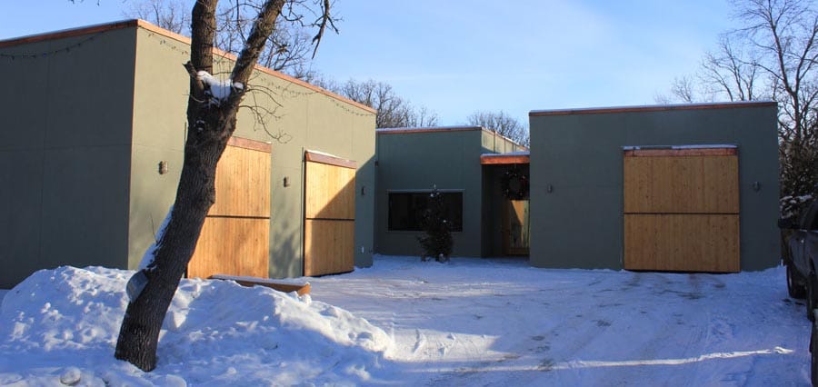 Three Schweiss garage doors