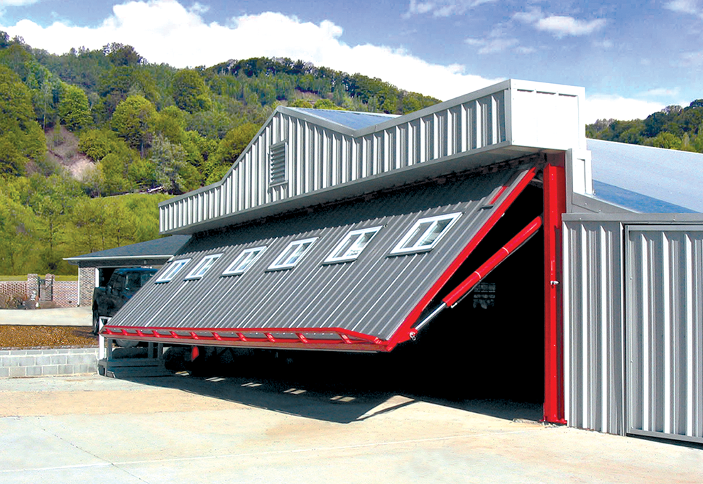 Schweiss red hydraulic doorframe clad in metal sheeting