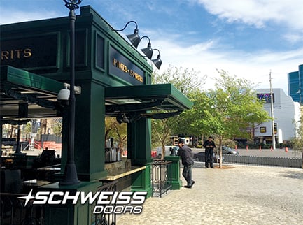 Four Schweiss Hydraulic Designer Doors open bar kiosk to Las Vegas strip