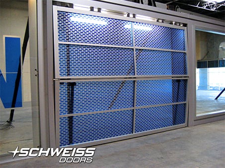 Custom-designed Schweiss door for mall Storefront