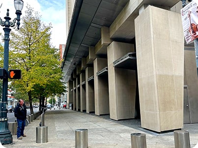 View from the right of repaired Hatfield Courthouse after upgrading their defenses with Schweiss Doors