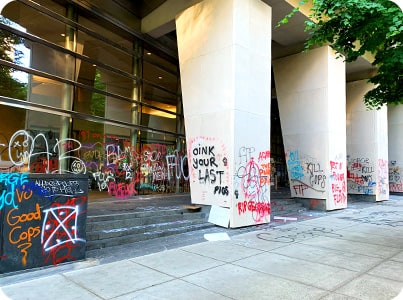 View from the left of damaged Hatfield Courthouse prior to upgrading their defenses with Schweiss Doors