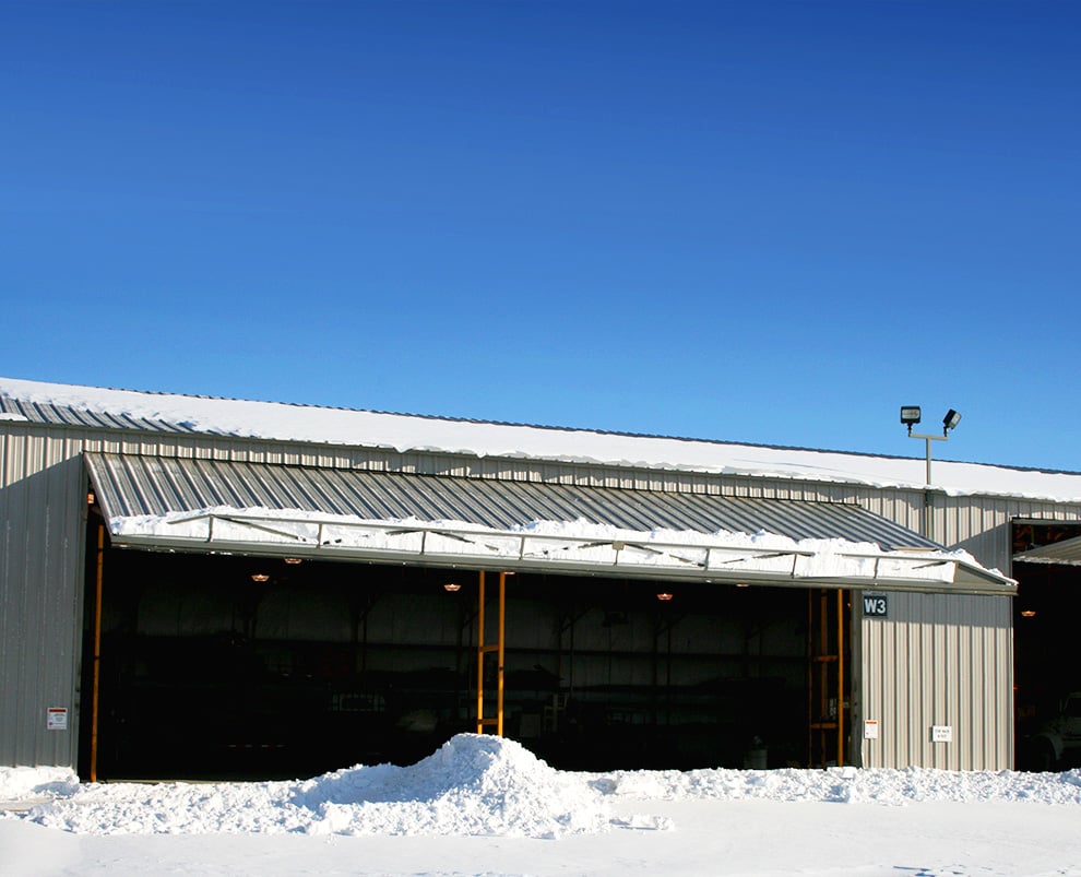 This is how it looks when snow comes down and ends up on external truss of hydraulic door