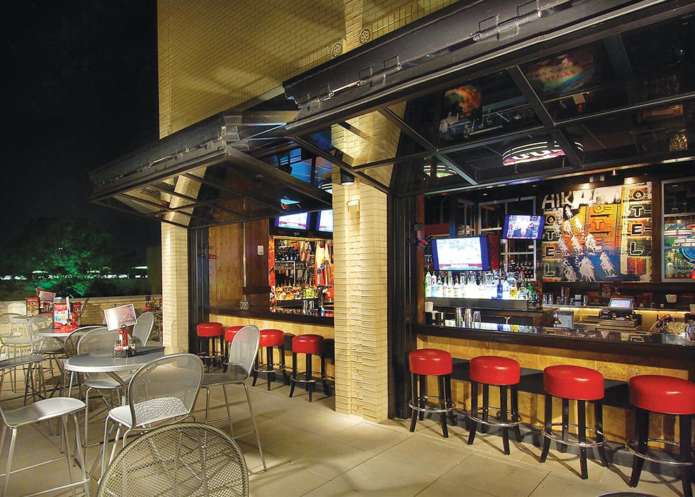 Schweiss bifold doors for restaurant franchise in Dallas, Texas