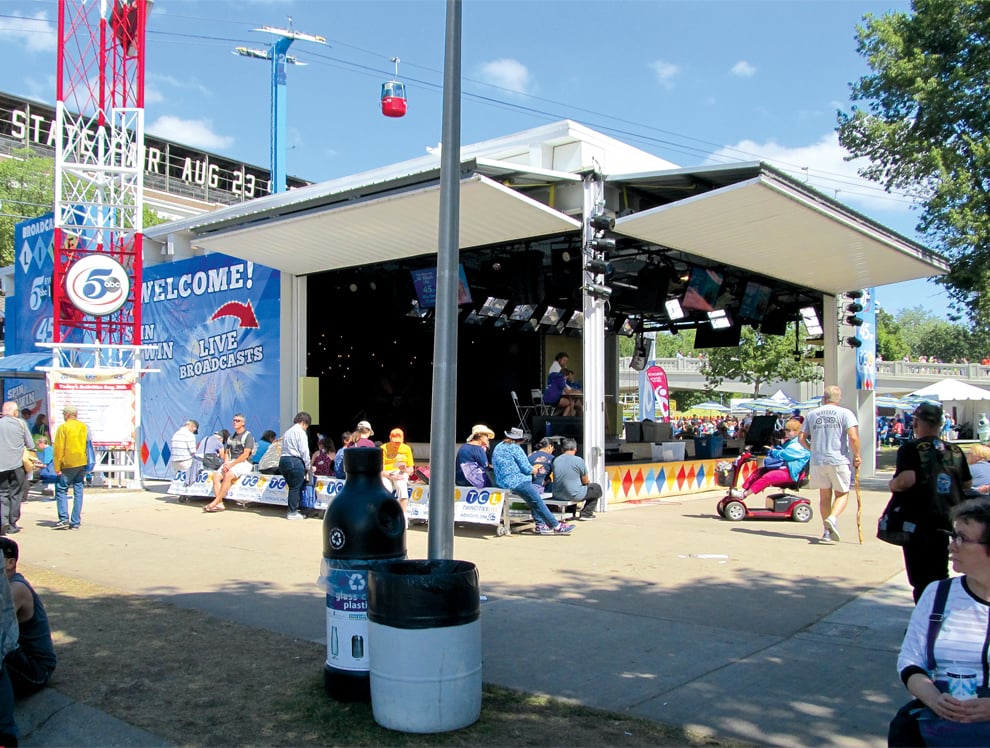 Schweiss Liftstrap doors at TV Booth in Minnesota draws crowd during live broadcasts