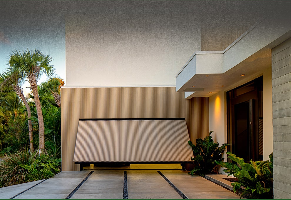 Alabama hydraulic door by Schweiss used on luxury garage