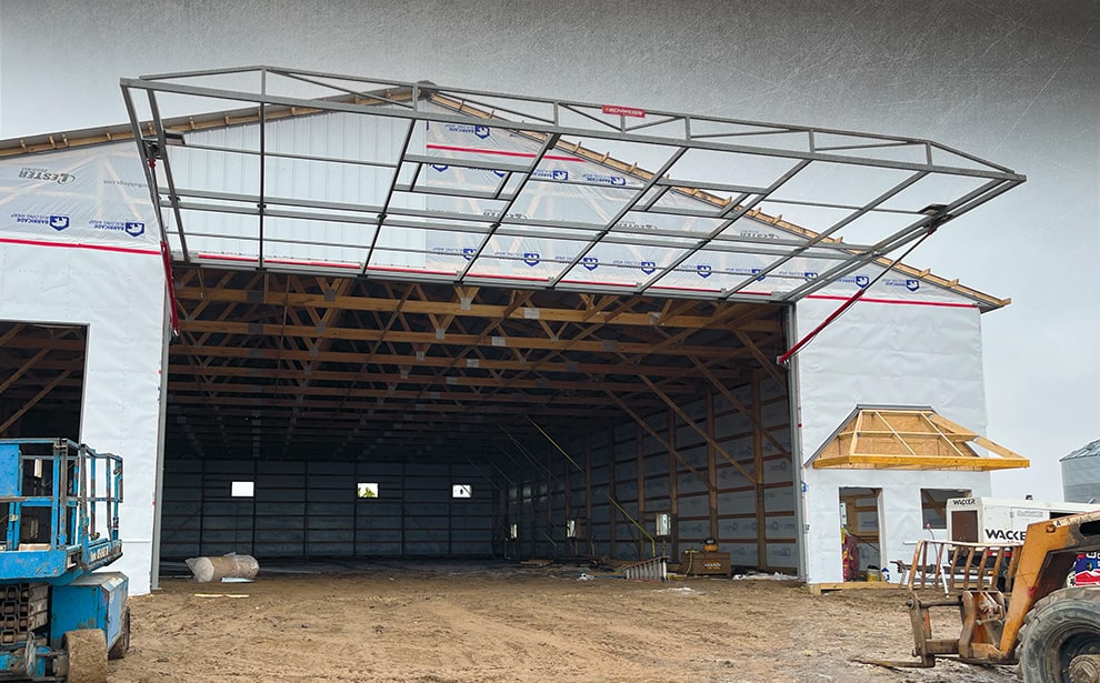 Georgia hydraulic door frame by Schweiss installed on building